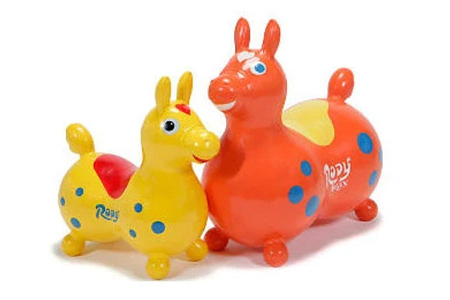 Rody balance horse toys in yellow and red with blue spots, featuring upright ears and small wheels, on white background