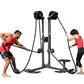 Two people using dual-station rope trainer with black handles and gray frame on white background