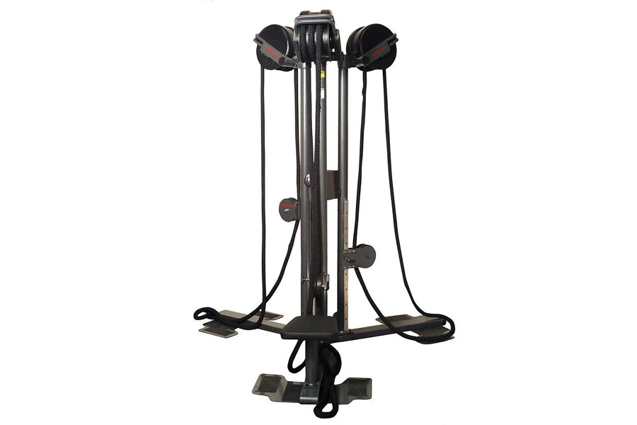 Black vertical rope trainer with dual handles and foot platform on white background