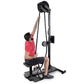 Man in red shirt using black upright rope trainer machine with pulley system on white background
