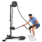 Man using black Ropeflex upright rope trainer with adjustable pulley system on white background