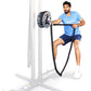 Man in blue t-shirt using black rope attached to gray mechanical drum attachment on wall-mounted frame