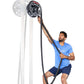 Man in blue shirt using black rope drum attachment mounted on white pole for training exercise