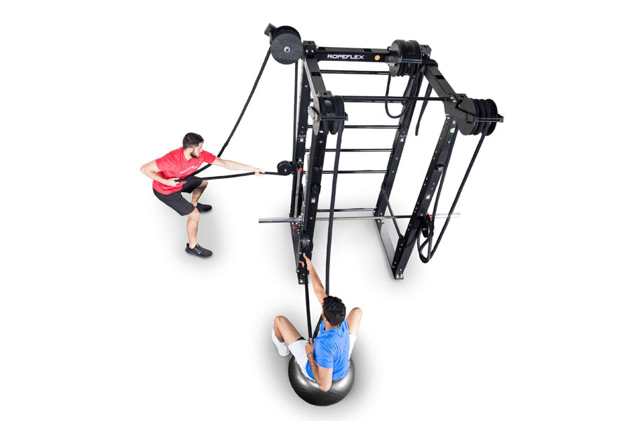 Black Ropeflex RX8200 Infinity Rack rope trainer with two users demonstrating exercises, one in red shirt pulling rope, one i