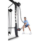 Man in blue shirt using black Ropeflex rope trainer machine with dual pulleys on white background