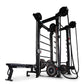 Black multi-functional fitness rack with rope trainer, pulley system, ladder bars, and weight plates on white background