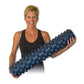 Black racerback sports tank top worn by model holding blue textured foam massage roller