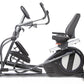BodyCraft SCT400g seated elliptical crosstrainer with black padded seat, dual handlebars, and large circular pedal mechanism 