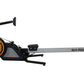 SHI-ROW Air rowing machine with black frame, orange circular fan wheel, and gray rail on white background