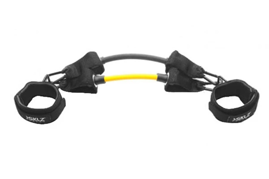 SKLZ Lateral Resistor Pro with black neoprene ankle cuffs and yellow resistance band on white background