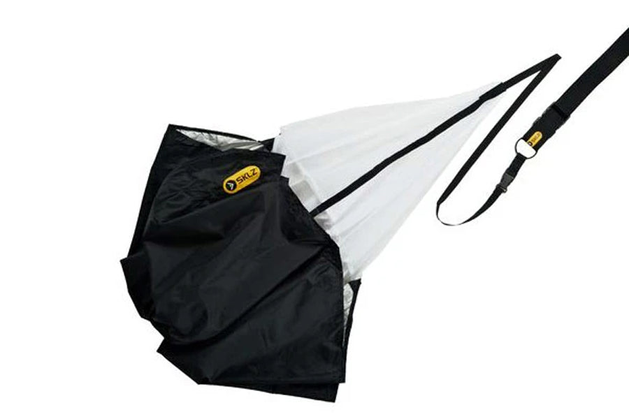 Black nylon speed chute with white interior, attached black strap with yellow logo accent on white background