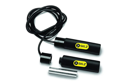 SKLZ weighted speed rope with black handles, yellow logo label, black cord, and metal weights on white background