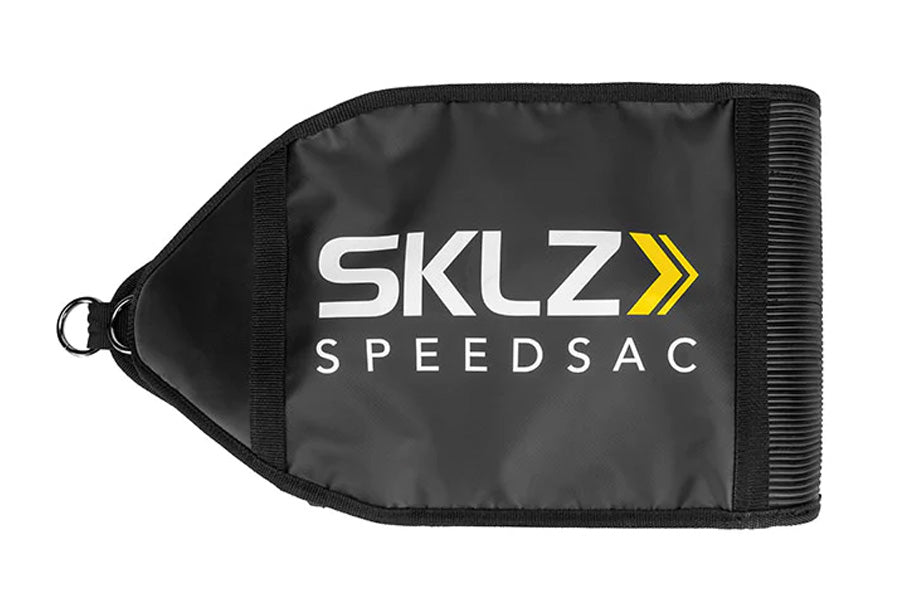 Black nylon SKLZ SpeedSac training bag with white logo and yellow arrow detail, featuring carry handle on white background