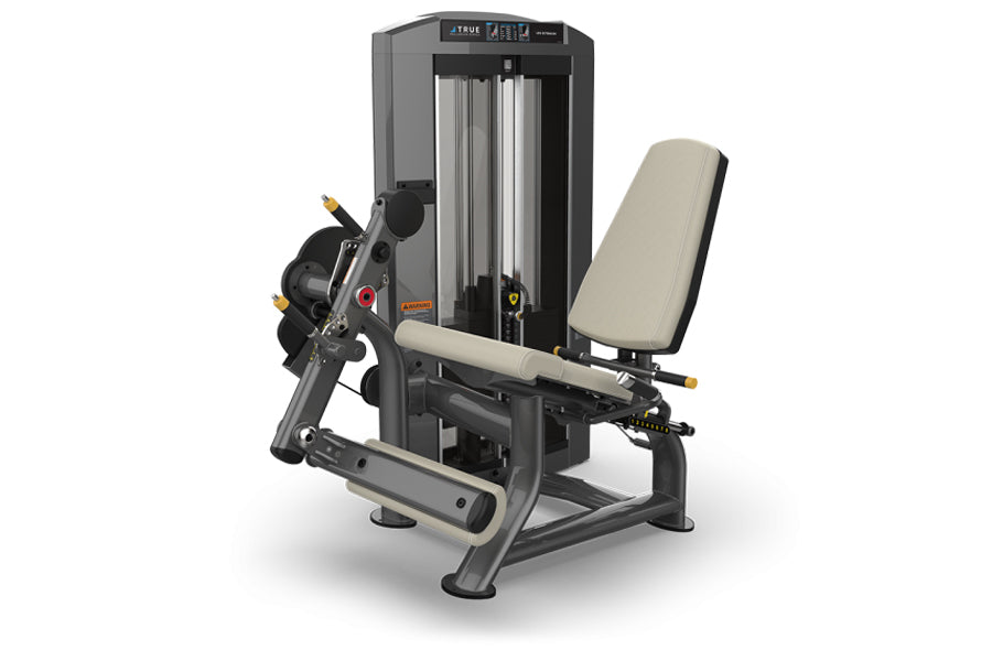 TRUE SPL-0100 seated leg extension machine with black frame, beige padded seat and backrest, digital display, and adjustable 