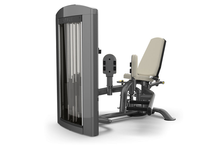 TRUE SPL-0400 leg press machine with gray frame, vertical cable stack on left, and beige padded seat and backrest on right, o