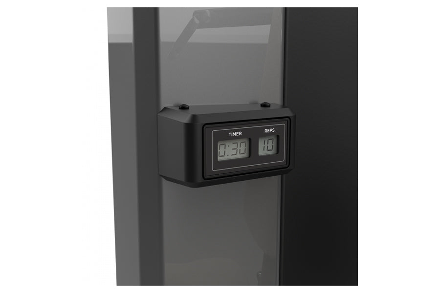 Black digital timer and rep counter display attached to gym equipment frame