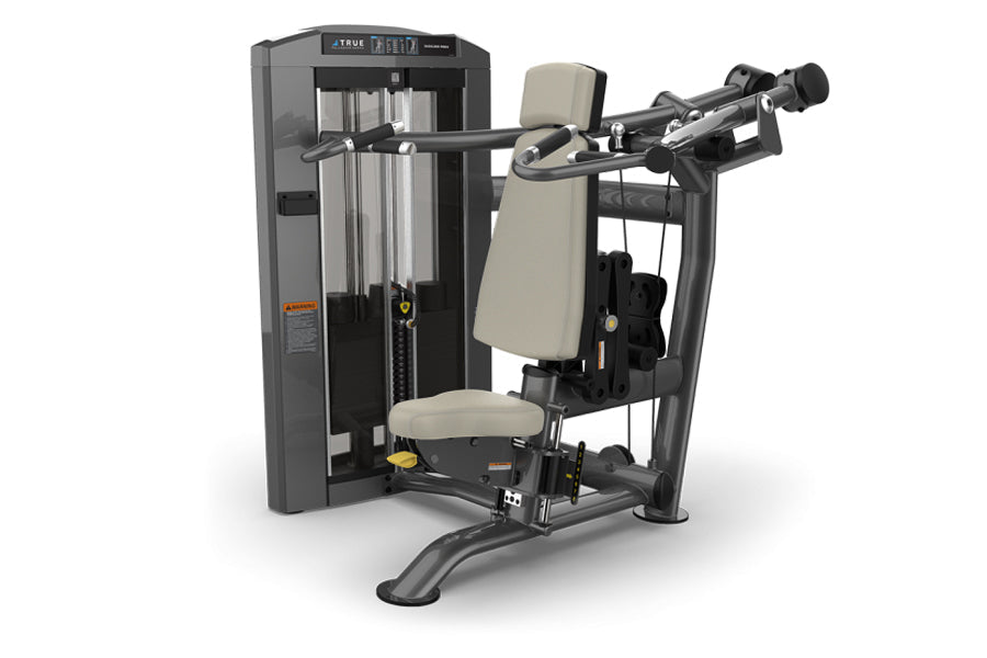 TRUE SPL-0700 seated shoulder press machine with black frame, beige padded seat and backrest, adjustable handles, displayed o