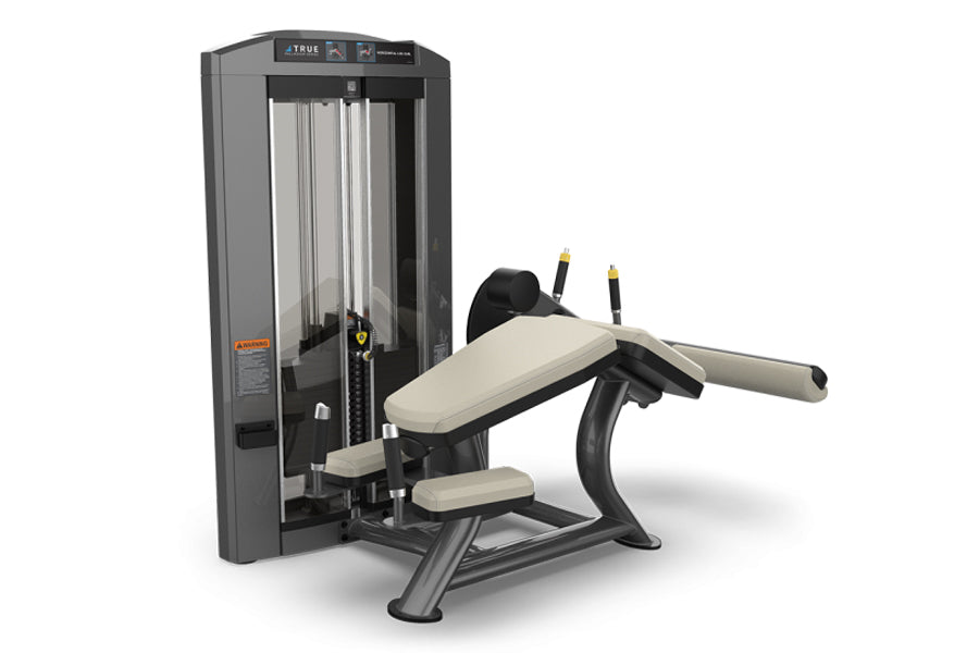TRUE SPL-1800 horizontal leg curl machine with cream-colored padded seat and black frame on white background