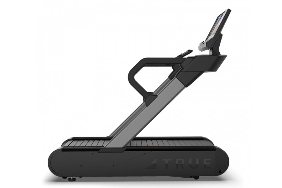 Black and gray TRUE Stryker Slat Treadmill with curved running surface and digital display console on white background