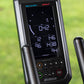 Black and gray stationary bike console displaying digital metrics including time, distance, and heart rate on screen, with Re