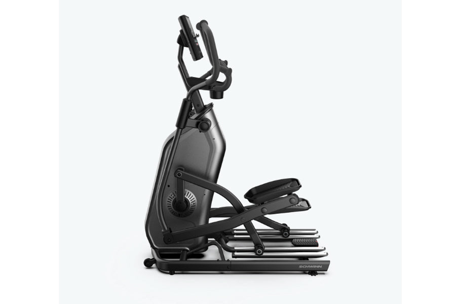 Schwinn 490 elliptical machine with black frame, large console display, dual handles, and foot pedals on white background