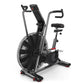 Schwinn Airdyne AD7 exercise bike with large black fan wheel, gray frame, black seat, and dual handlebars on white background