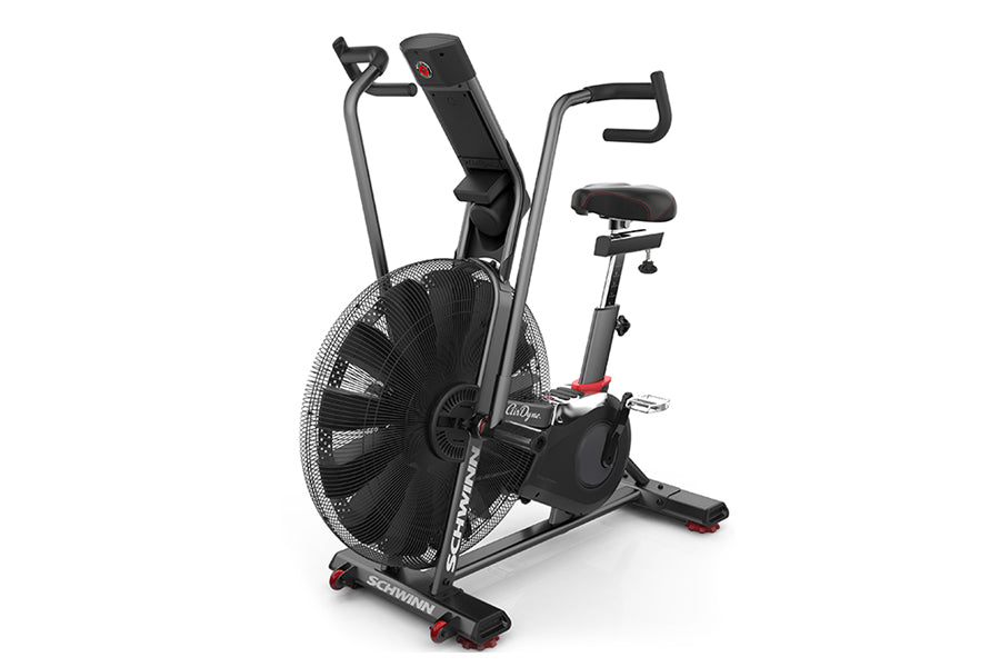 Schwinn Airdyne AD7 exercise bike with large black fan wheel, gray frame, black seat, and dual handlebars on white background