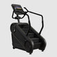 Black StairMaster Gauntlet 4G StepMill with digital console display and handrails on white background