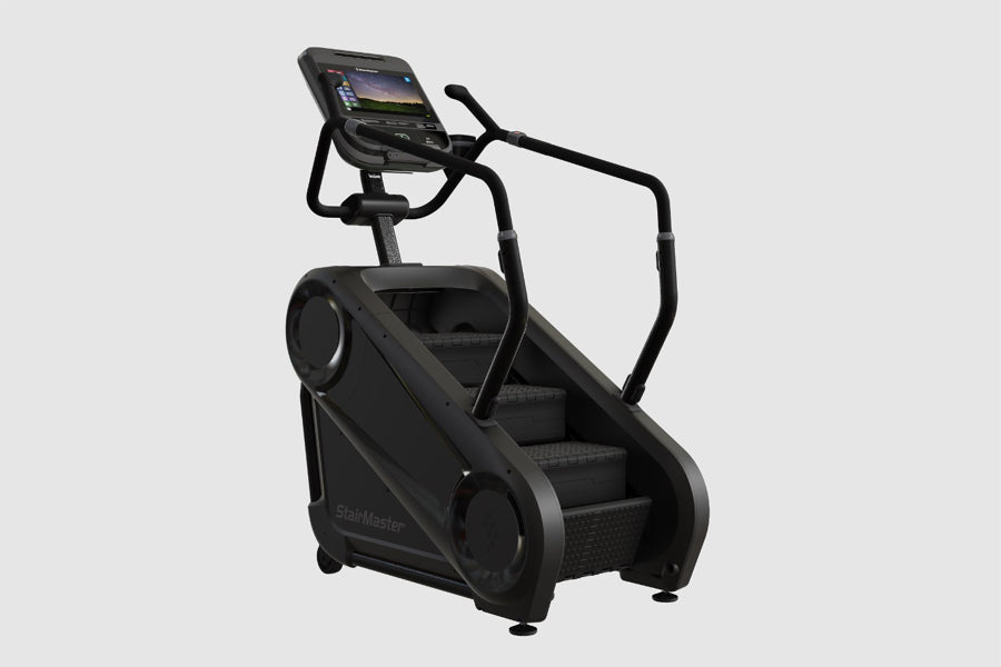 Black StairMaster Gauntlet 4G StepMill with digital console display and handrails on white background