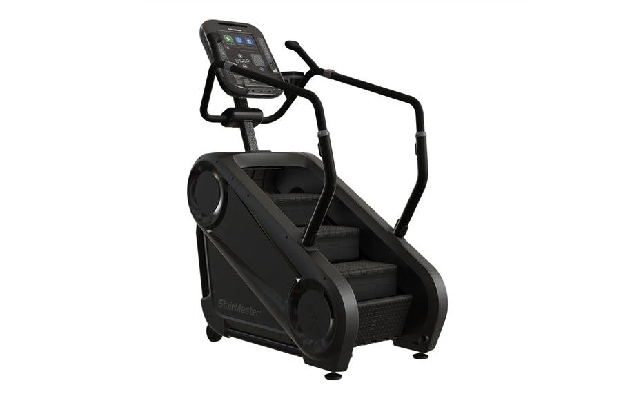 Black StairMaster Gauntlet 4G StepMill with digital display console and handrails on white background