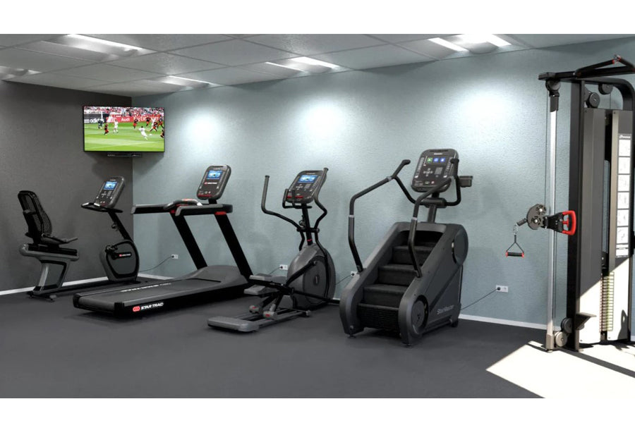StairMaster Gauntlet 4G StepMill with digital display in modern gym setting with cardio equipment