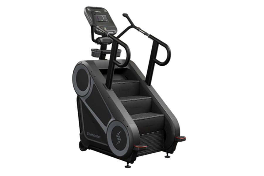 StairMaster 8Gx Gauntlet black stair stepper with digital console, handrails, and stepped platform on white background