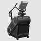 Black StairMaster 8Gx Gauntlet stair stepper with tablet holder and handlebar, on white background