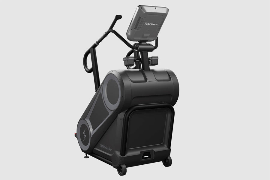 Black StairMaster 8Gx Gauntlet stair stepper with tablet holder and handlebar, on white background