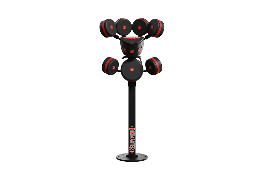 Black and red boxing training tower with four upper and two lower weighted bags on adjustable arms, standing base with brandi