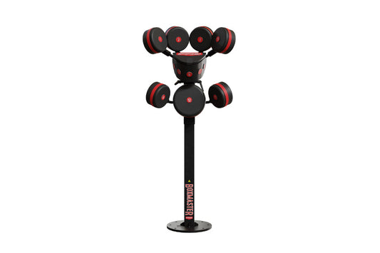 Black and red boxing training tower with four upper and two lower weighted bags on adjustable arms, standing base with brandi