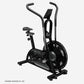 Black air exercise bike with curved dual handles, digital display console, and fan-style wheel, on white background