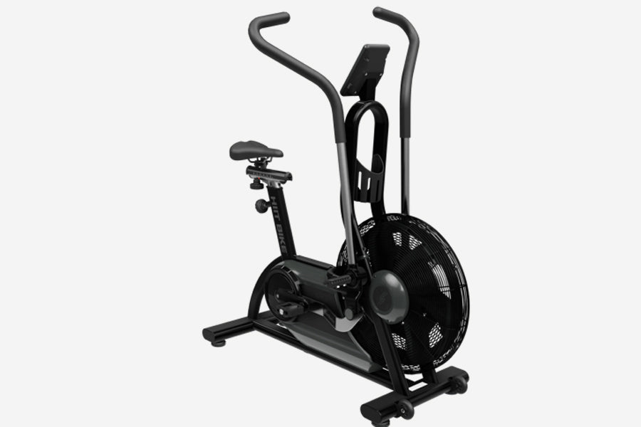 Black stationary air exercise bike with curved handlebars, digital display, and large mesh fan wheel on white background