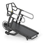 Black motorized treadmill with dual handrails, digital display, and textured running belt on white background