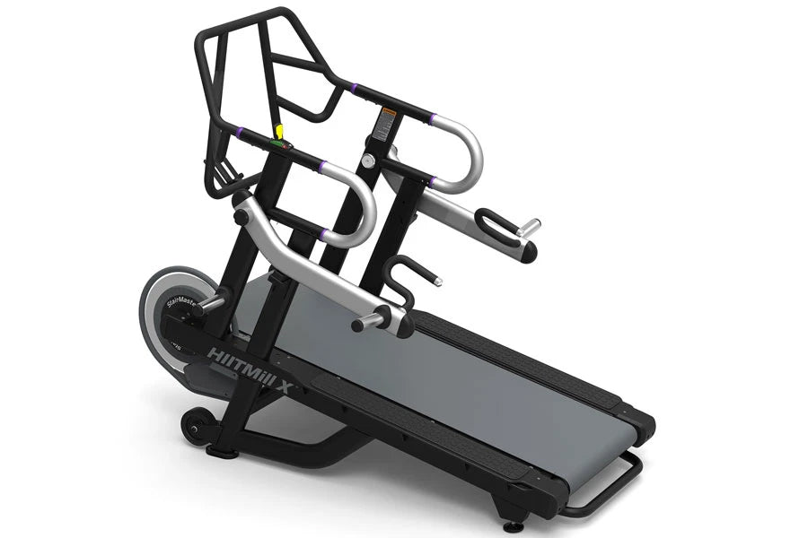 Black and gray StairMaster HIITMill X treadmill with dual handles and digital display on white background