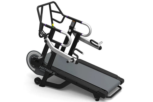 Black and gray StairMaster HIITMill X treadmill with dual handles and digital display on white background