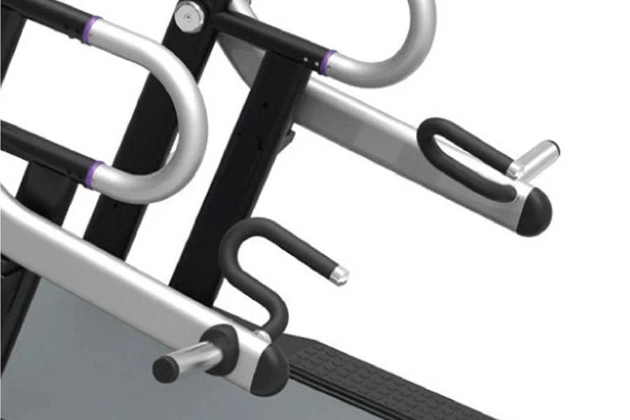 Silver and black motorized treadmill with curved handles, purple accent grips, and digital display panel on white background