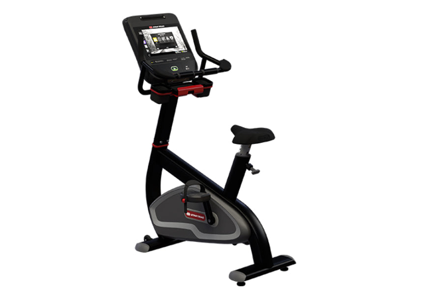 Black and gray upright exercise bike with red accents, digital console display, and adjustable seat on white background
