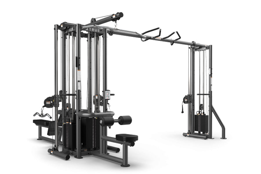 TRUE TMS5000 modular gym frame with cable crossovers and dual weight stacks in black and gray, on white background