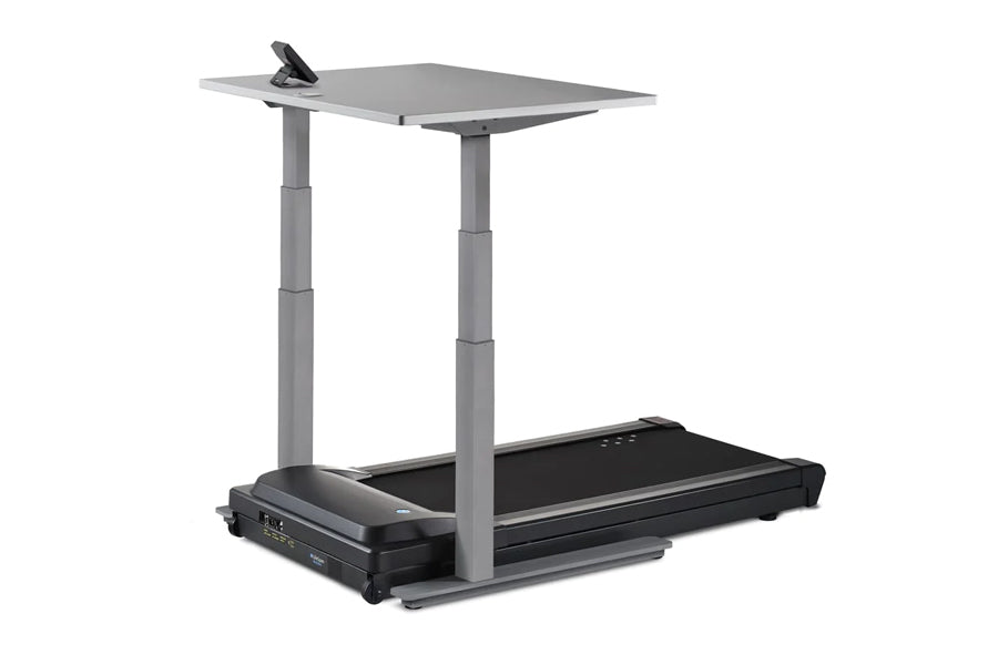 LifeSpan TR1000-Omni desk treadmill with black running belt, gray adjustable desk surface, and control panel on white backgro