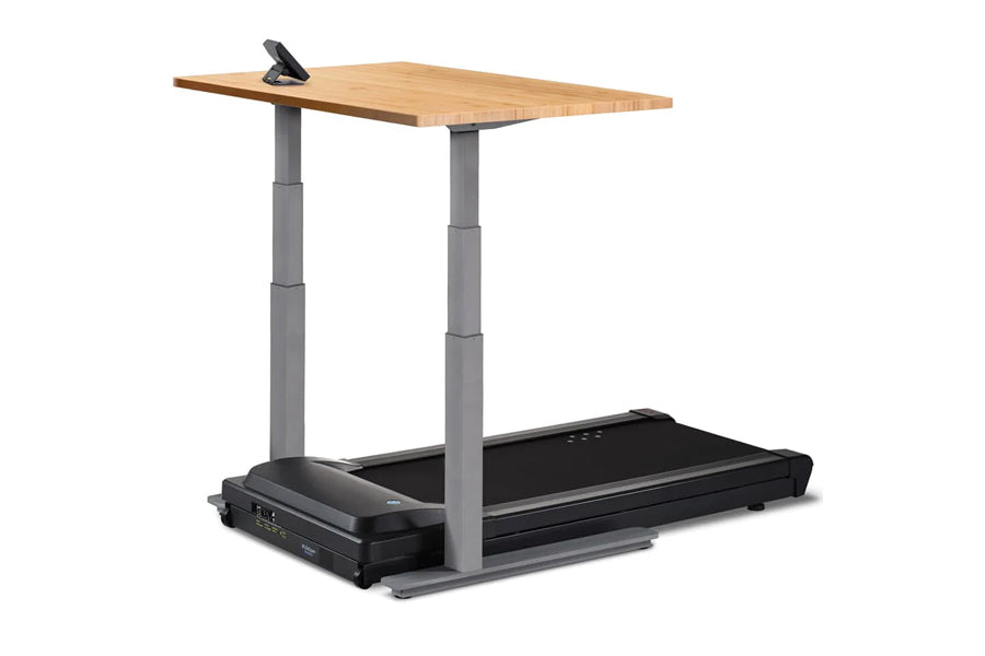 LifeSpan TR1000-Omni Desk Treadmill with natural wood top, gray adjustable columns, and black motorized base on white backgro