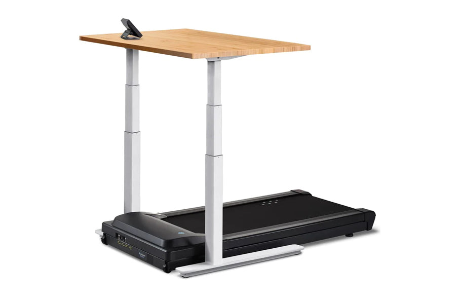 LifeSpan TR1000-Omni Desk Treadmill with black running belt, silver adjustable legs, and natural wood desktop on white backgr