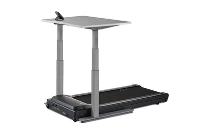 Gray and black motorized treadmill desk with adjustable height gray columns, black running surface, and gray desktop work sur