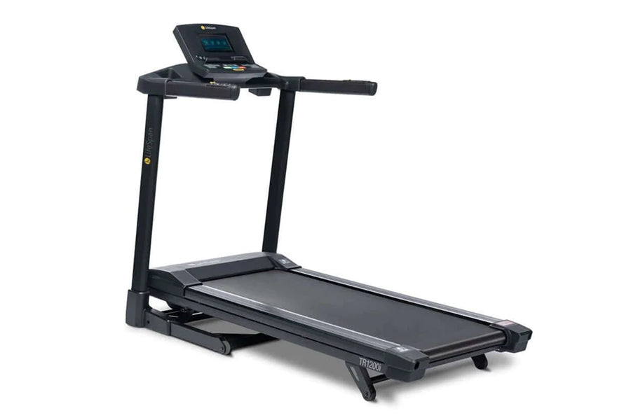 Black folding treadmill with digital display console, handrails, and cushioned running deck on white background