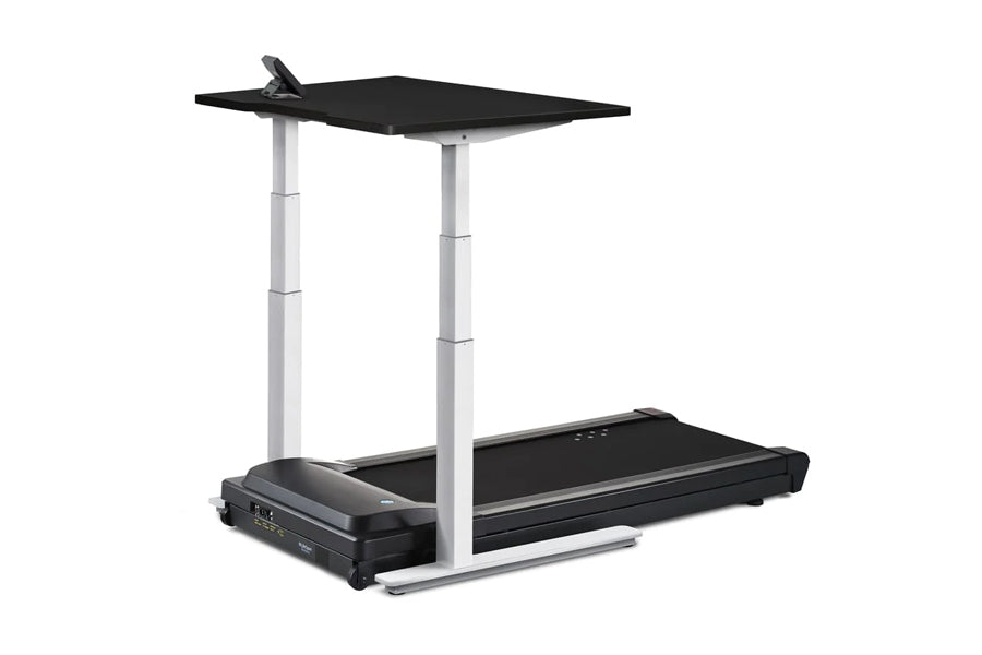LifeSpan TR5000-Omni desk treadmill with black belt, white metal frame, and adjustable black desktop surface on white backgro